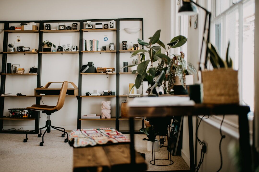 Vintage-inspired home office with wooden desk and bookshelves